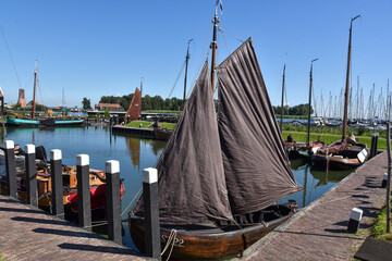 The harbor of the Zuiderzee Museum with the old fishing boats of Enkhuizen.