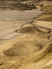 Fototapeta na wymiar badlands of romania, vulcanii noroisi reserve near berca, buzau county, mud vulcanoes landscape
