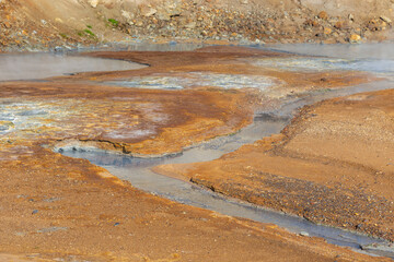 Geothermal area, hot steam, solfataras and hot mud cauldrons. Krisuvik, western Iceland.