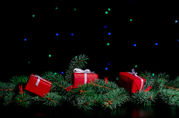 gifts black background christmas tree red light new year copy space