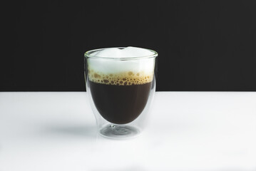 coffee in a glass on a black white background