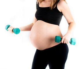 Active healthy pregnant woman exercising with dumbells, isolated on white background.