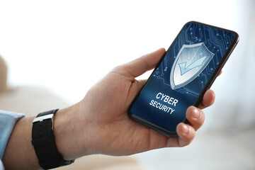 Cyber security concept. Man using application on phone, closeup