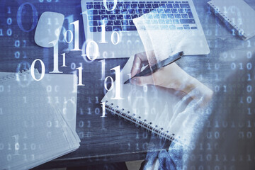 Multi exposure of writing hands on background with data solution hologram. Technology concept.