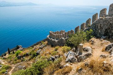 Fototapeta na wymiar View of the walls of the ancient fortress and the harbor in Alanya in Turkey