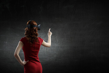Woman wearing virtual reality goggles