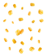 Sweet corn kernels falling on white background