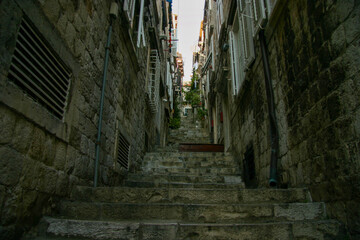 Dark Narrow Stairs Alley in the Old Town of Dubrovnik, Croatia