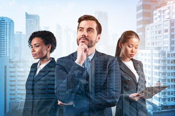 Group of three business partners in suits dreaming and looking for new opportunities to succeed....