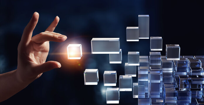 Hand holding glowing cubes. Innovation and creativity concept.