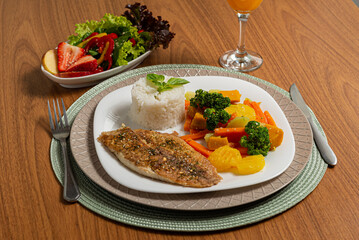 grilled chicken fillet with rice and vegetables