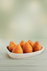 Brazilian snack deep fried chiken sttufed croquette isolated - Coxinha de frango