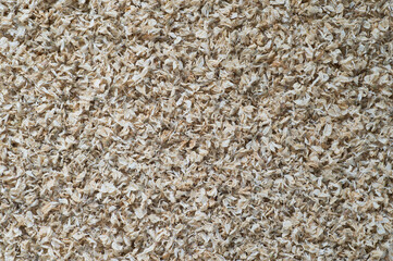 Organic texture of dry white acacia petals. Background.