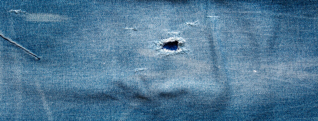 texture of blue jeans denim fabric background