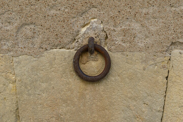 old rusty ring in a wall