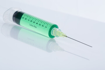 half covered syringe ground mirrored, diagonal alignment 