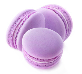 Three purple macaroons (blueberry or blackberry) isolated on white background