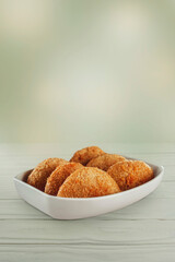 Brazilian snack deep fried beef croquette isolated - Risolis de carne