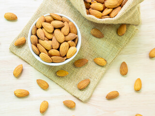 Almond (raw) in white bowl.