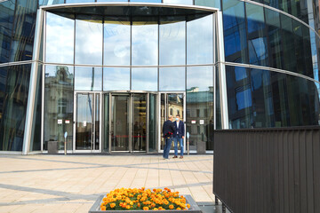 Saint Petersburg, Russia-September 4, 2020: Forum participants talk at the entrance to the modern...