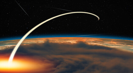 Long exposure night time rocket launch, falling stars in the background - Planet Earth with a spectacular sunset - "Elements of this image furnished by NASA"  © muratart