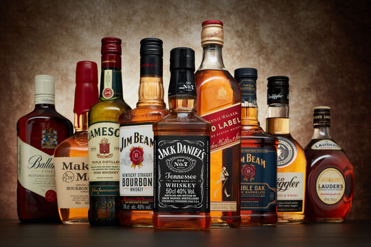 Bottle of Jack Daniels Jennessee whiskey on background of other popular brands of whiskey (whisky)