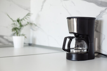 Auto Drip Coffee Maker on white countertop at kitchen
