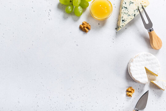 Different sorts of cheese on backround