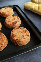 Homemade almond cookies on rustic background