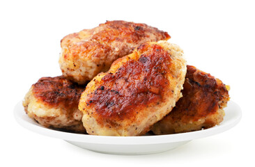 Fried cutlets on a plate on a white background. Isolated