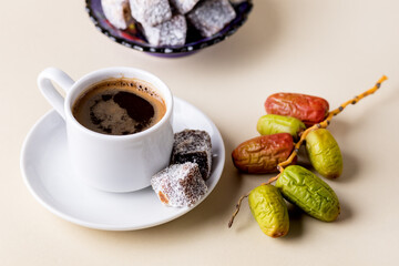 Turkish Delight Lokum on Small Bowl and Cup of Turkish Coffee on Yellow Background Tasty Eastern Sweets Dessert Horizontal