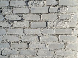 close-up of a wall of white blocks. cement mix between blocks