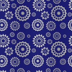 Design on Christmas paper in blue. Christmas paper for printing. Blue seamless pattern.Blue background with Christmas snowflakes...