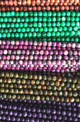 Background from colored beads. Colorful background.