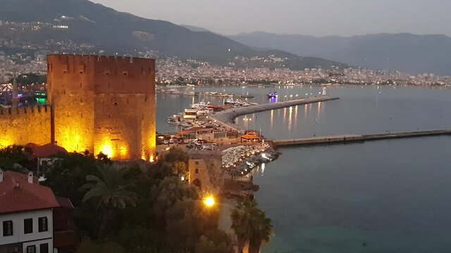 Alania.Turkey.September 4, 2020.View of the walls of the ancient fortress and the tower of Kyzyl Kule in Alanya in Turkey at sunset