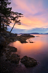 Peaceful and colorful sunset over the Salish Sea near Anacortes, Washington. San Juan Islands