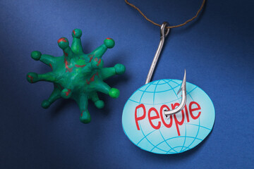 Toy bacteria, tag with text and a large hook. Concept on the topic: humanity is held hostage by the...