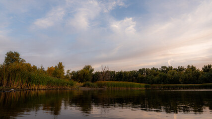 
Autumn views of the evening lake Krugloye. Natural park 