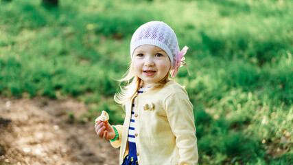 little girl in a field of flowers