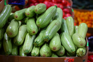 Fresh zucchini on the counter of the store