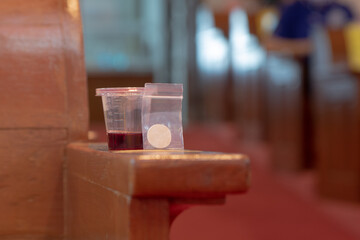 Communion New Normal Style - In One Time Use Containers To Protect People From The Pandemic COVID-19
