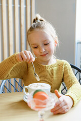 little child drinking tea
