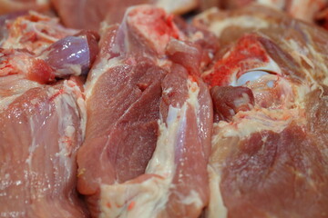 Raw pork chop on cutting board