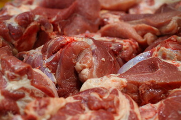 Raw pork chop on cutting board