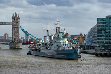 Obraz premium Mythical warship on the river Thames of the light cruiser type, named HMS Belfast. Photograph taken in London, England, United Kingdom.