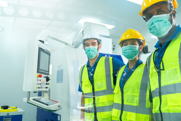 Professional engineering walking discuss inspecting with engineer team in clean room machinery factory area. Manager hand use tablet listen report paper for internal audit. Quality assurance