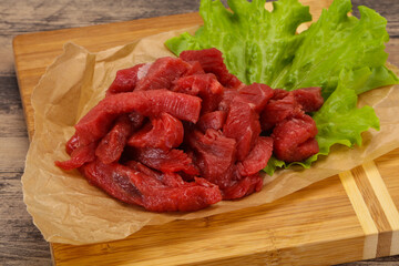 Raw beef meat sliced for cooking