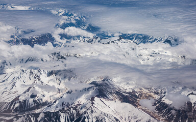 Fototapeta na wymiar Snowy Chile Mountains Seen from Sky