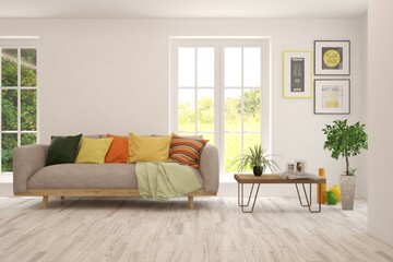 White living room with sofa and summer landscape in window. Scandinavian interior design. 3D illustration
