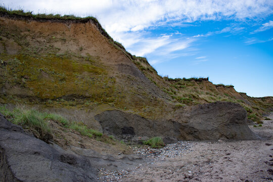 Nature background.  Soft focus of geological structure, landslide on steep coastal cliffs 